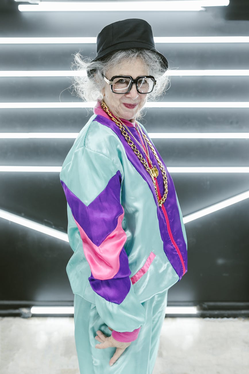 woman wearing black hat and colorful jacket